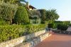 Foto esterno della proprietà Appartamento in Residence Gli Olivastri di Cala Moresca